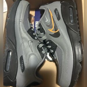 Nike Air Max Men's Gray and Black Sneakers with Orange Swoosh